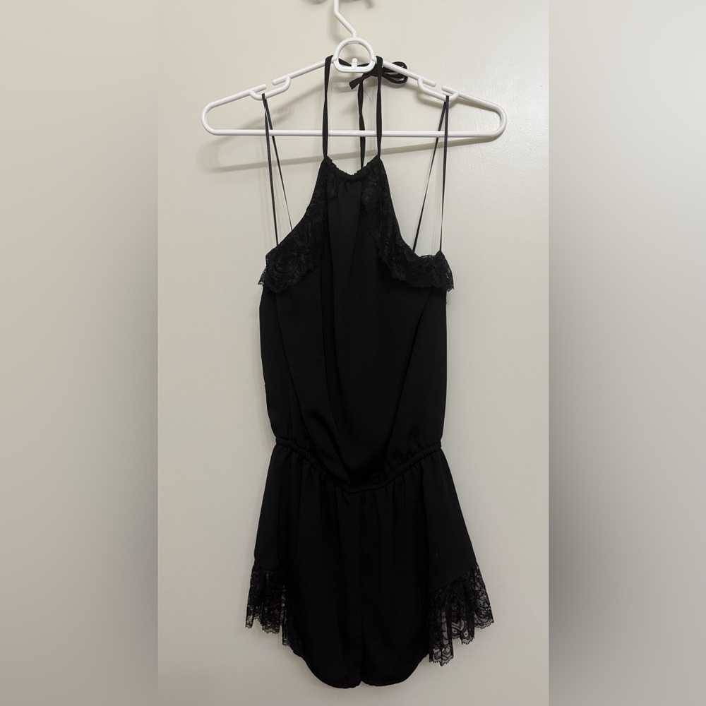 Guess short romper with lace detail. Brand new.